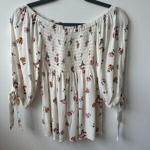 White floral blouse